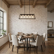 Dining Room - Elegant dining space featuring the textured beauty of Caldera Cork wallpaper in Warm White by York Wallcoverings.