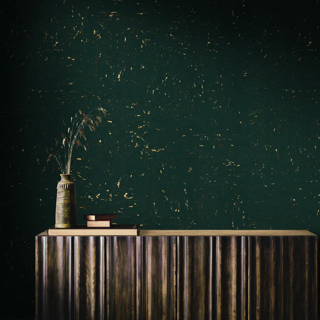 Luxurious living room showcases York Wallcoverings' Caldera Cork wallpaper in Deep Green and Cork, adding organic texture.