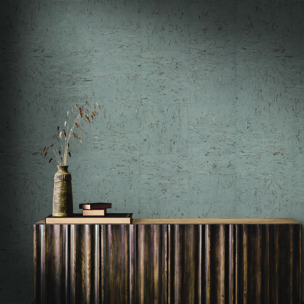 Modern living room featuring Caldera Cork wallpaper in Cool Grey by York Wallcoverings, adding natural texture to the space.
