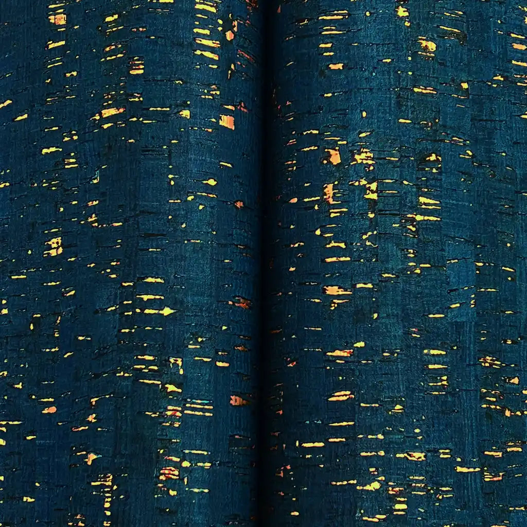 Close-up texture of York Wallcoverings' Caldera Cork wallpaper in Teal and Tan, highlighting its natural, detailed surface.