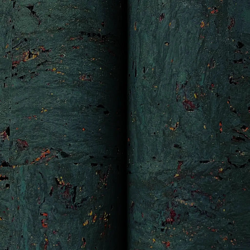 Close-up texture detail of York Wallcoverings' Caldera Cork wallpaper in Charcoal, highlighting its natural cork patterns.