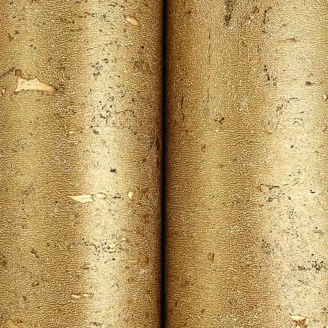 Detailed close-up of York Wallcoverings' Tan Caldera Cork wallpaper, emphasizing its rich, natural cork texture.