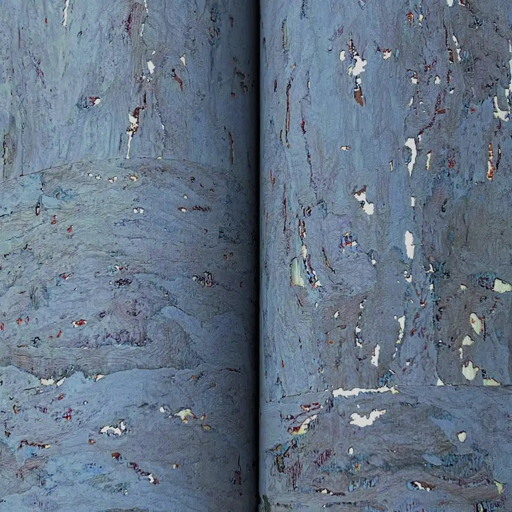 Intricate texture detail of York Wallcoverings' Caldera Cork wallpaper in rich Slate Purple.