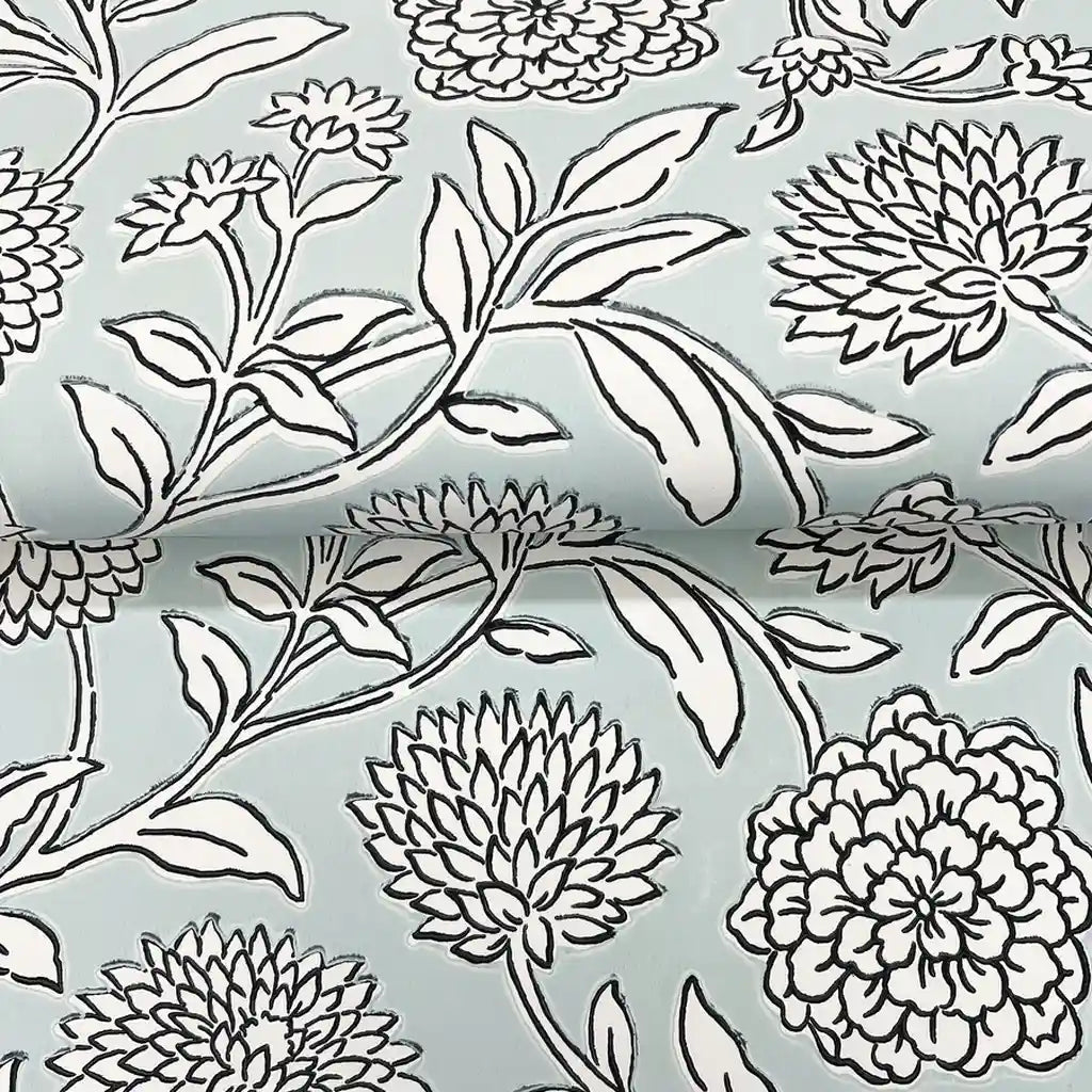 Close-up of the delicate blue and white texture on York Wallcoverings' "Chatsworth Garden" wallpaper, revealing its unique pattern.