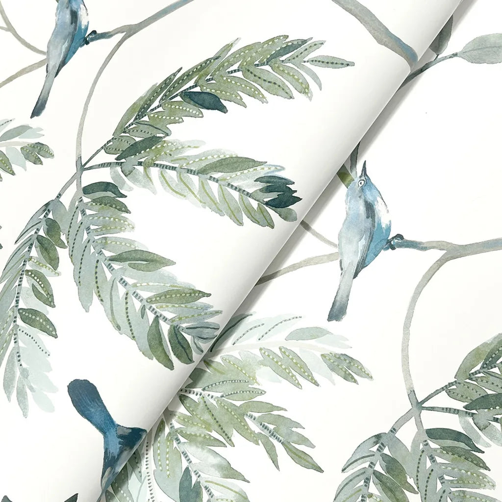 Close-up of Cillian wallpaper by York Wallcoverings, highlighting its intricate blue, green, white texture detail.