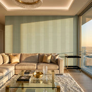 Living Room - Showcases York Wallcoverings' Colbert Stripe wallpaper in Sage, Cream, Gold, adding sophisticated style.