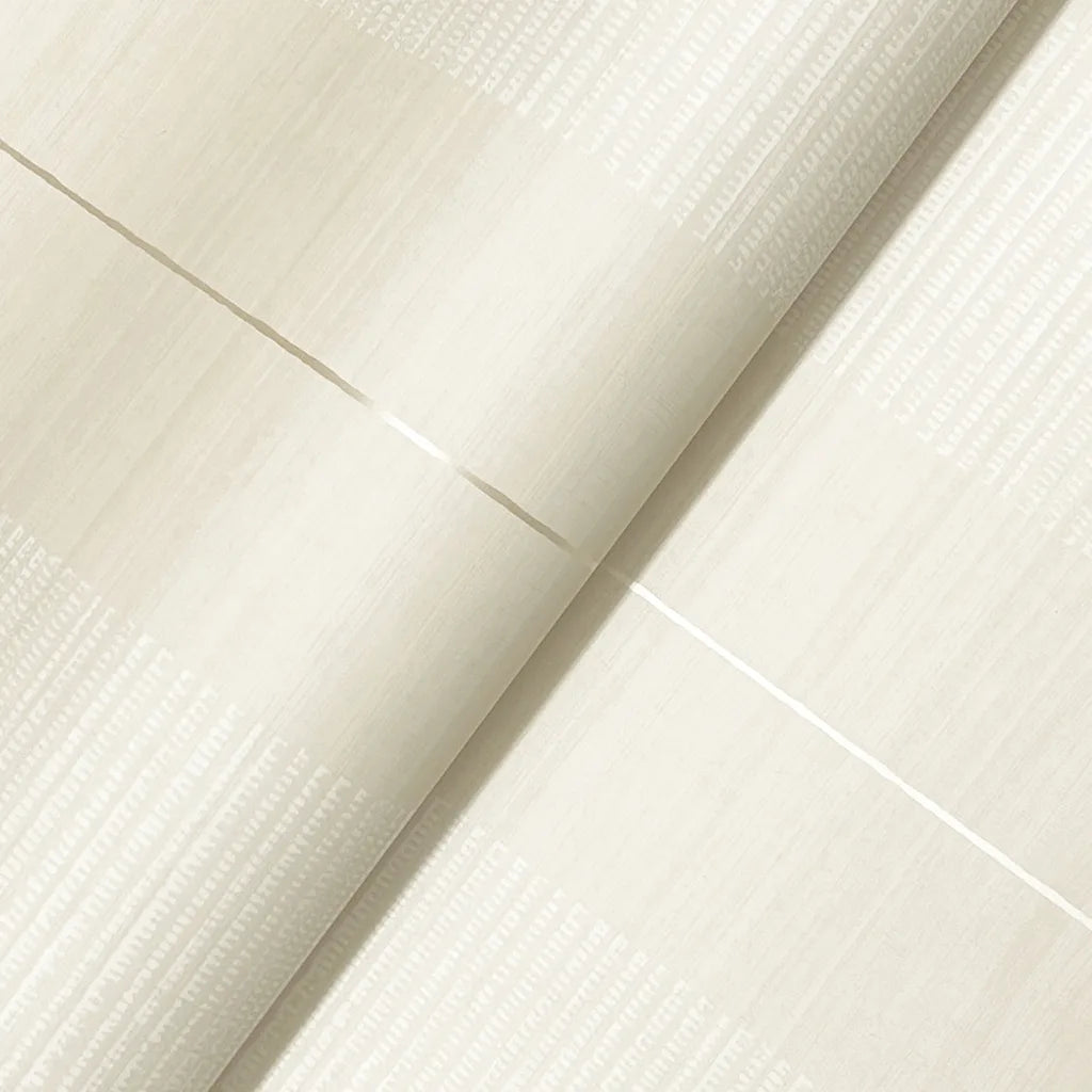 Close-up texture of York Wallcoverings' Colbert Stripe wallpaper, showcasing its elegant cream and white woven pattern.