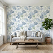 Living Room - York Wallcoverings' Cotswolds Poppies wallpaper in Dusty Blue and Sage Green creates a serene atmosphere.