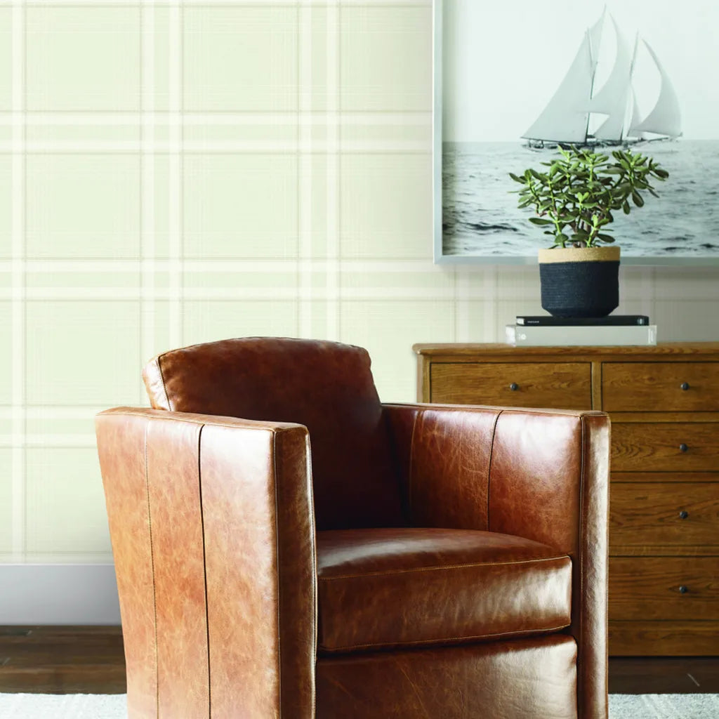 Warm Ivory Country Club Plaid wallpaper by York Wallcoverings brings classic elegance to this inviting living room.