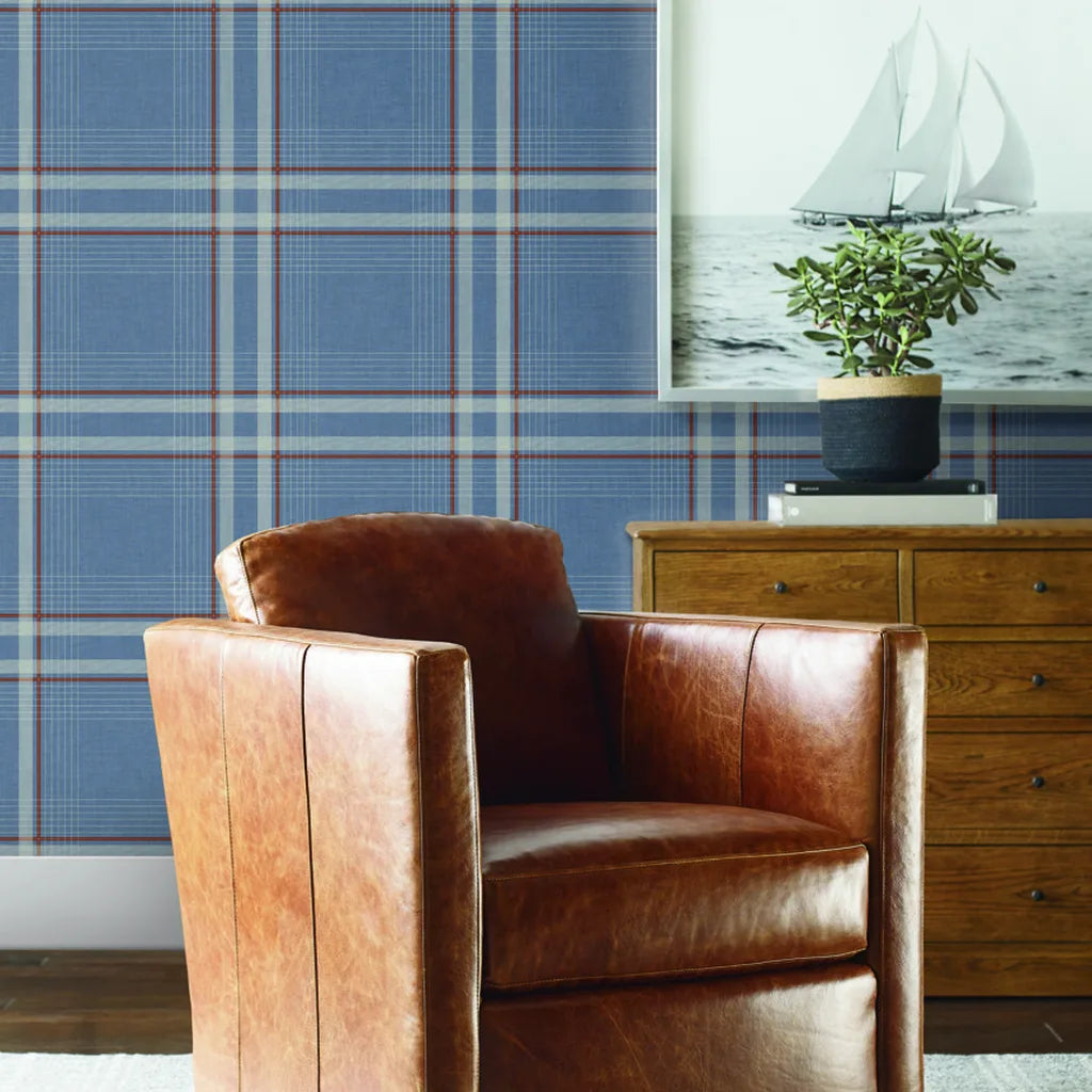 Living room showcasing Country Club Plaid Dusty Blue wallpaper by York Wallcoverings, adding classic style.