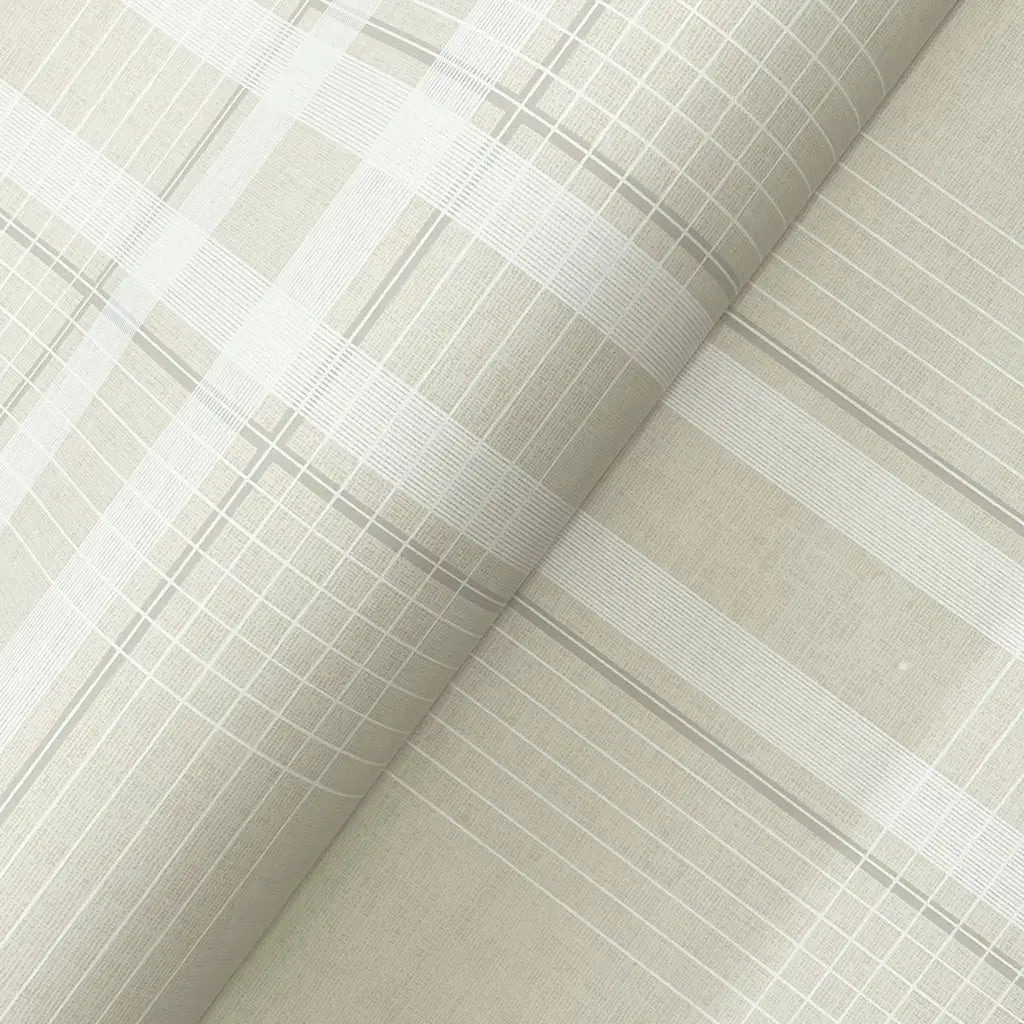 Close-up texture detail of York Wallcoverings' Warm Ivory "Country Club Plaid" wallpaper, highlighting its intricate fabric-like pattern.