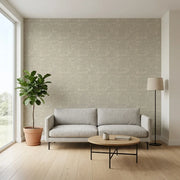 Living Room - Greige 'Crystal Cloud' wallpaper by York Wallcoverings enhances this elegant living space with subtle texture.