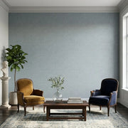 Living Room - Modern living room with Dusty Blue Crystal Cloud wallpaper by York Wallcoverings, creating a serene and elegant space.