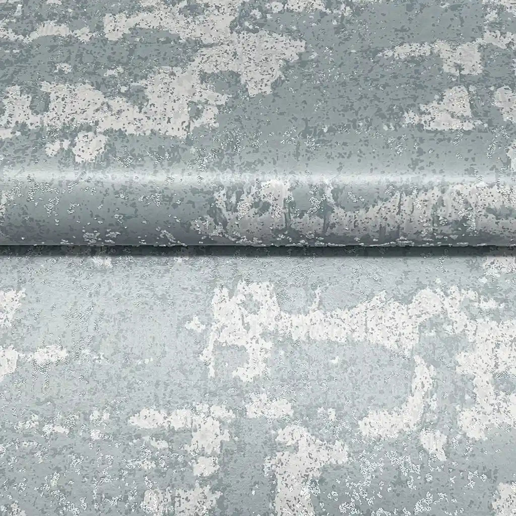 Close-up texture of York Wallcoverings' Crystal Cloud wallpaper in Dusty Blue, revealing its subtle, elegant sheen and intricate pattern.