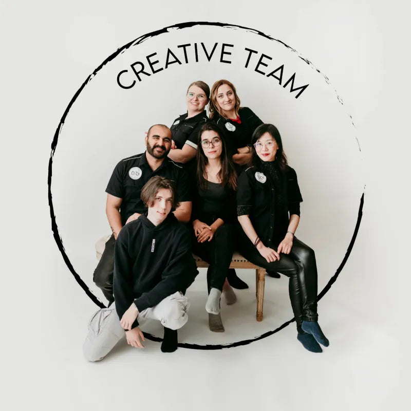 Group photo of the Decor2Go creative team in a bright studio, seated and standing together under a “Creative Team” graphic.