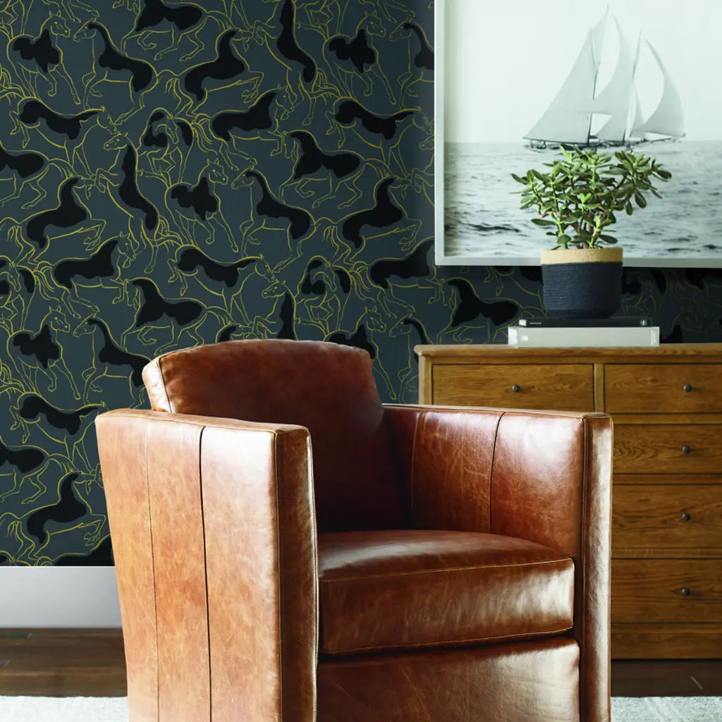 Elegant living room with Dressage wallpaper by York Wallcoverings in Slate Blue and Gold, adding a touch of luxury.