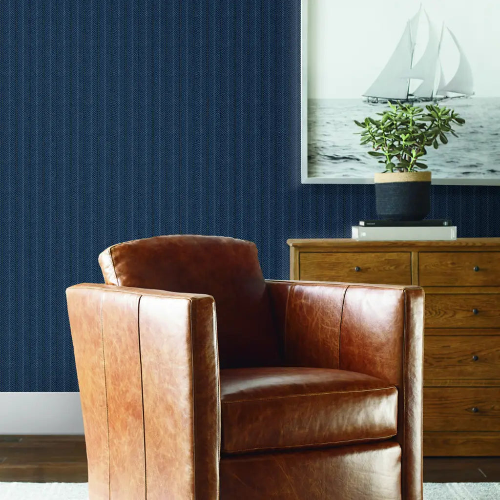 Navy Blue Elkan Stripe wallpaper by York Wallcoverings adds classic style to this inviting living room design.