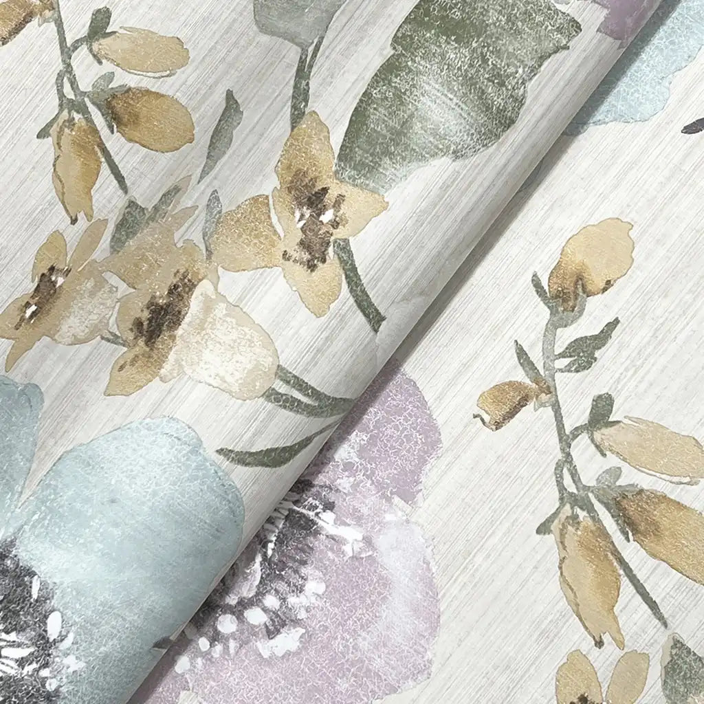 Close-up texture detail of York Wallcoverings Evelyn wallpaper in Lavender, Blue, and Cream hues.