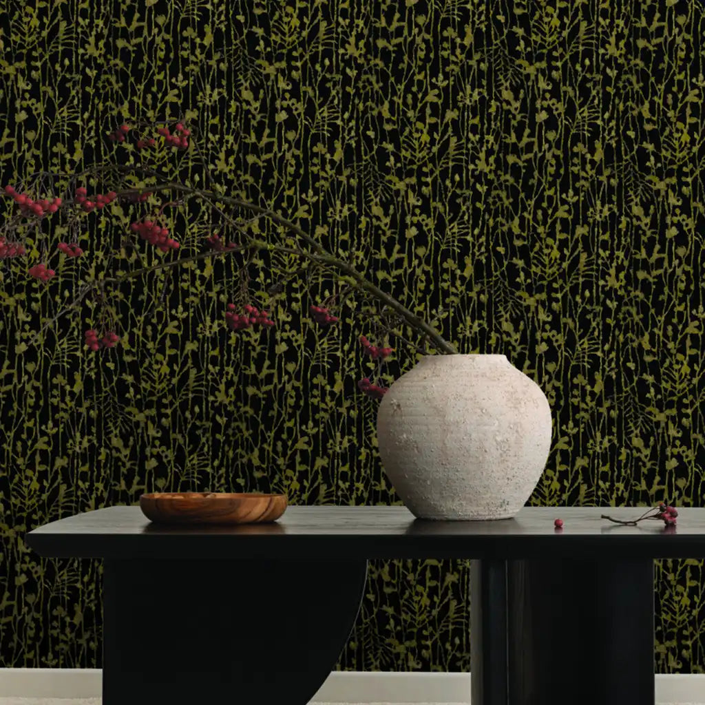 Elegant living room showcasing 'Filigree' Black and Gold wallpaper by York Wallcoverings, adding a luxurious touch.