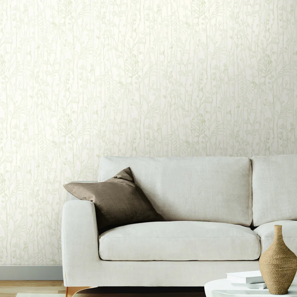 Elegant living room showcasing Filigree wallpaper in Champagne by York Wallcoverings, adding a touch of luxury.