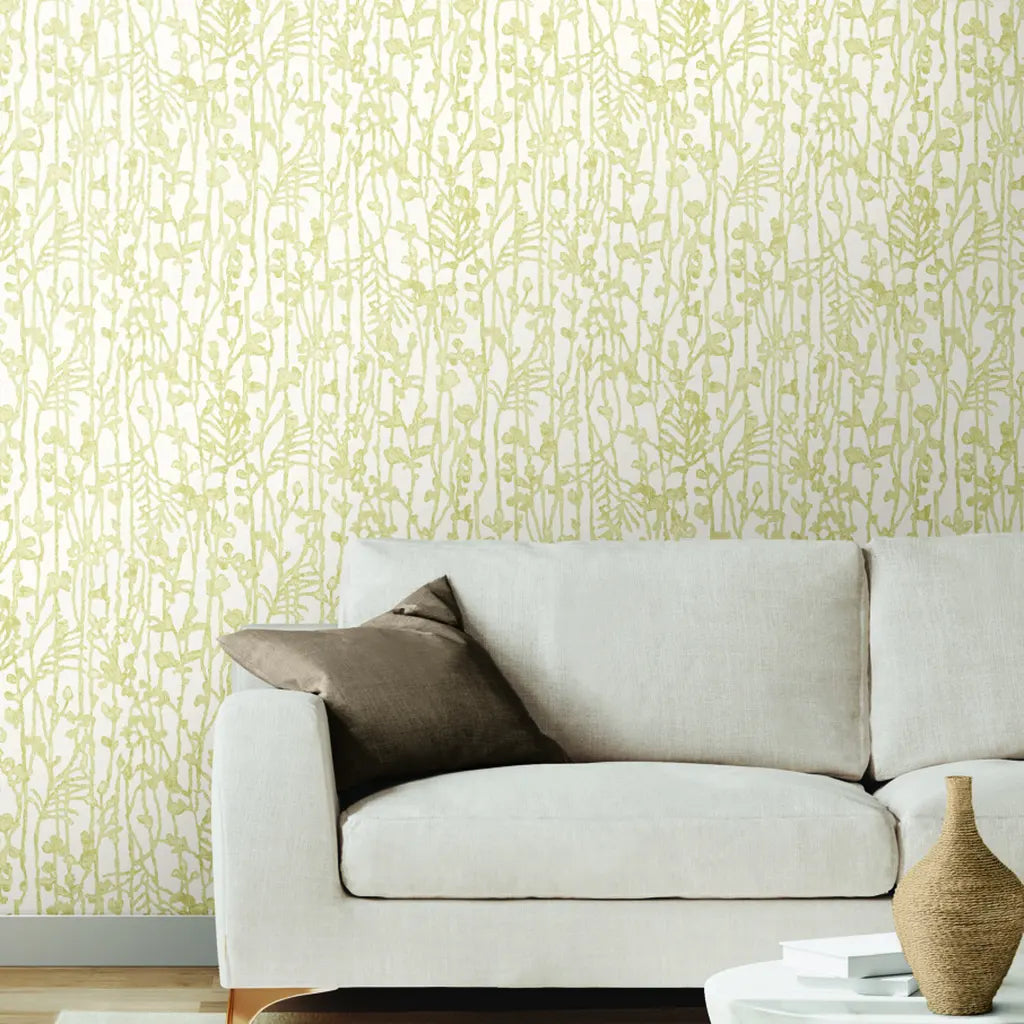 Living room showcasing elegant York Wallcoverings 'Filigree' wallpaper in Cream Gold, adding luxury to the space.