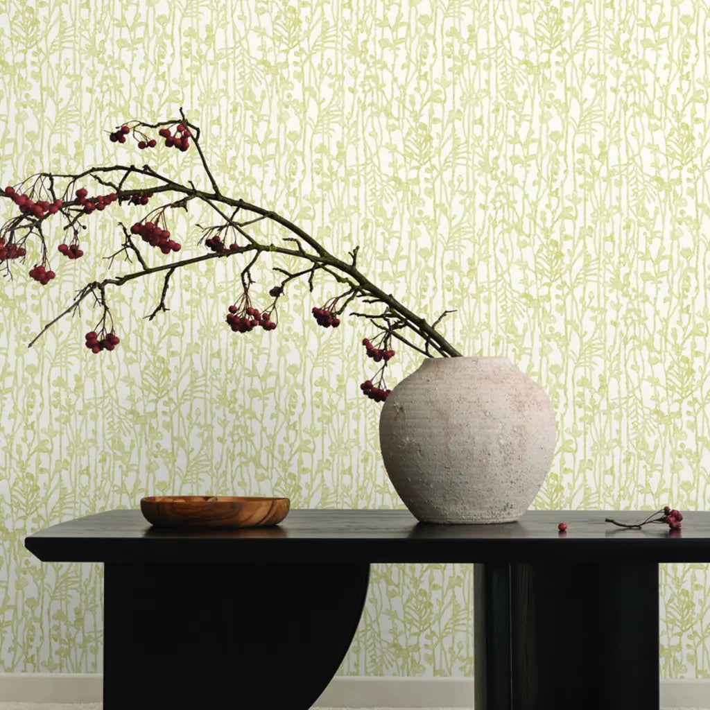 Elegant living room features 'Filigree' wallpaper in Cream Gold by York Wallcoverings, adding a luxurious touch to the decor.