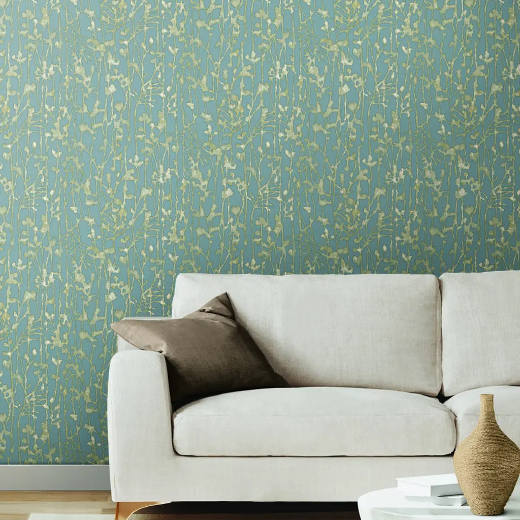 Elegant living room featuring 'Filigree' wallpaper in Dusty Blue by York Wallcoverings, creating a serene and stylish space.
