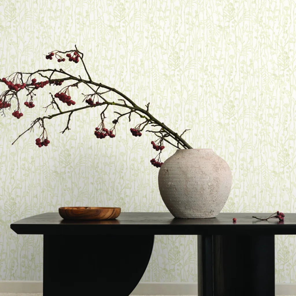 Living room showcasing elegant Filigree Warm Ivory wallpaper by York Wallcoverings, adding a sophisticated touch to the space.