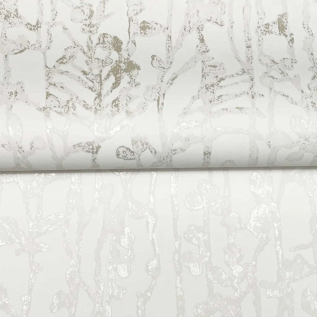 Close-up of intricate Filigree champagne wallpaper by York Wallcoverings, highlighting its luxurious textured detail.