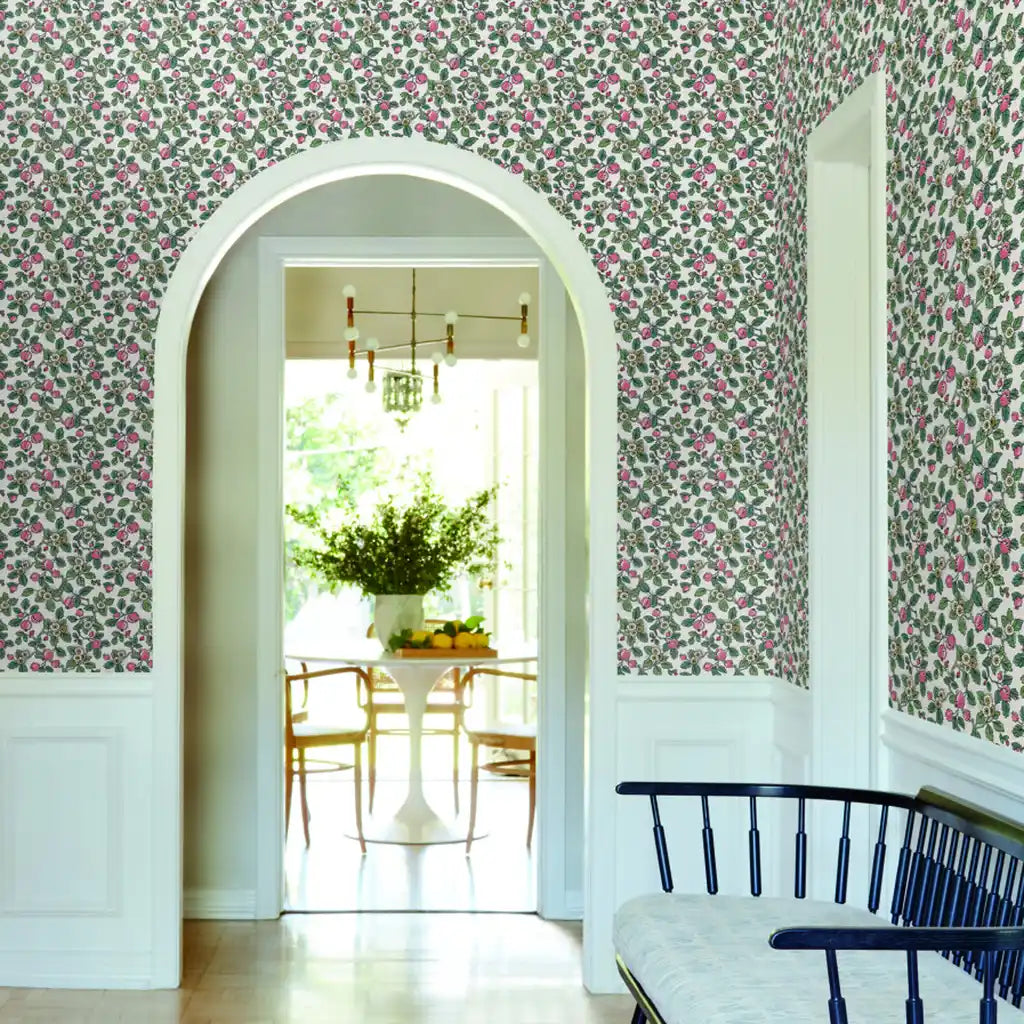 Vibrant entryway featuring York Wallcoverings' "Framboise" wallpaper in Pink, Green, White.