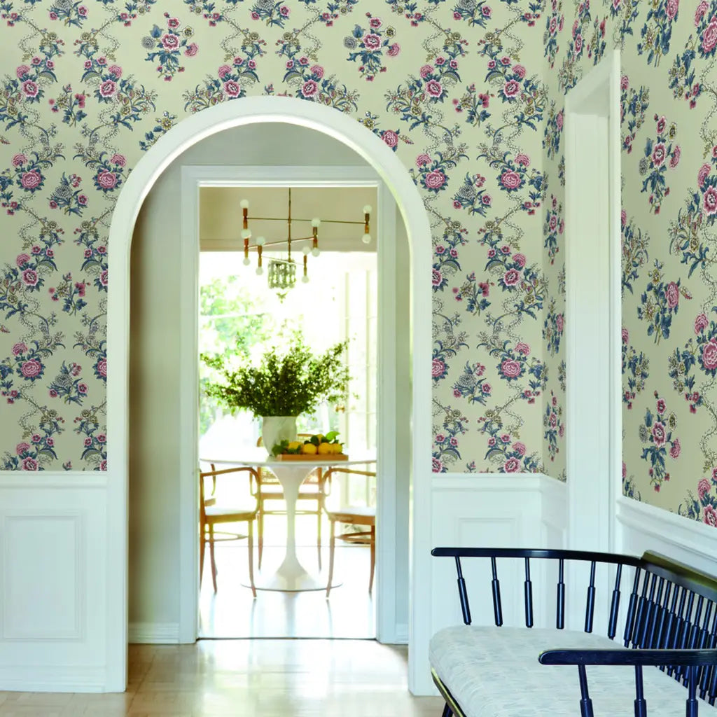 Stylish entryway featuring "Genevieve" wallpaper in Pink, Beige, Blue by York Wallcoverings.