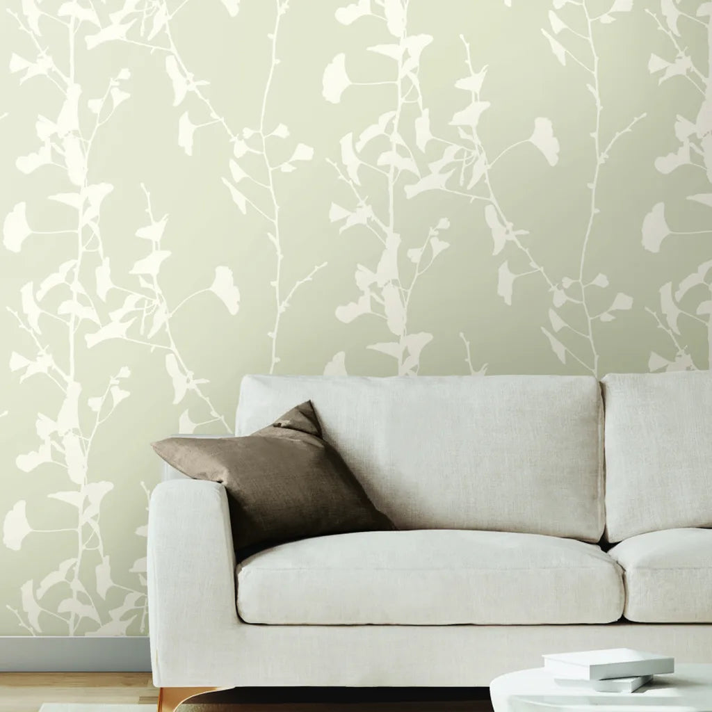 Warm Ivory Ginkgo Silhouette wallpaper by York Wallcoverings enhances this elegant living room with a touch of nature.
