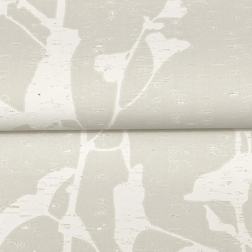 Close-up texture detail of York Wallcoverings' Ginkgo Silhouette wallpaper in Warm Ivory, showcasing its subtle pattern.