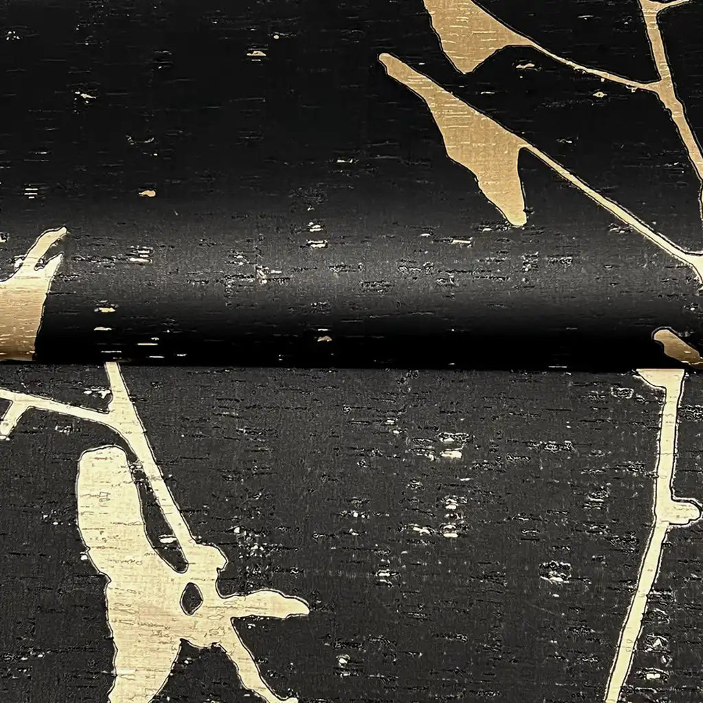 Close-up texture detail of York Wallcoverings' 'Ginkgo Silhouette' wallpaper, showcasing charcoal and tan colors.