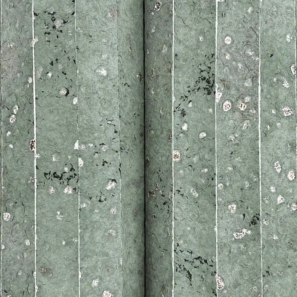 Close-up texture of Greige Handcrafted Paper wallpaper by York Wallcoverings, revealing intricate detail and natural fibers.