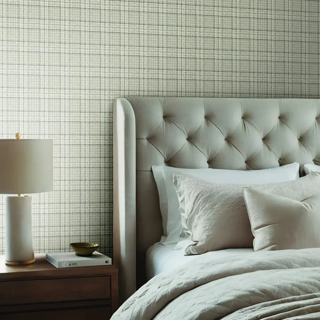 Light Beige Plaid Harrington Plaid wallpaper by York Wallcoverings adorns a cozy bedroom.