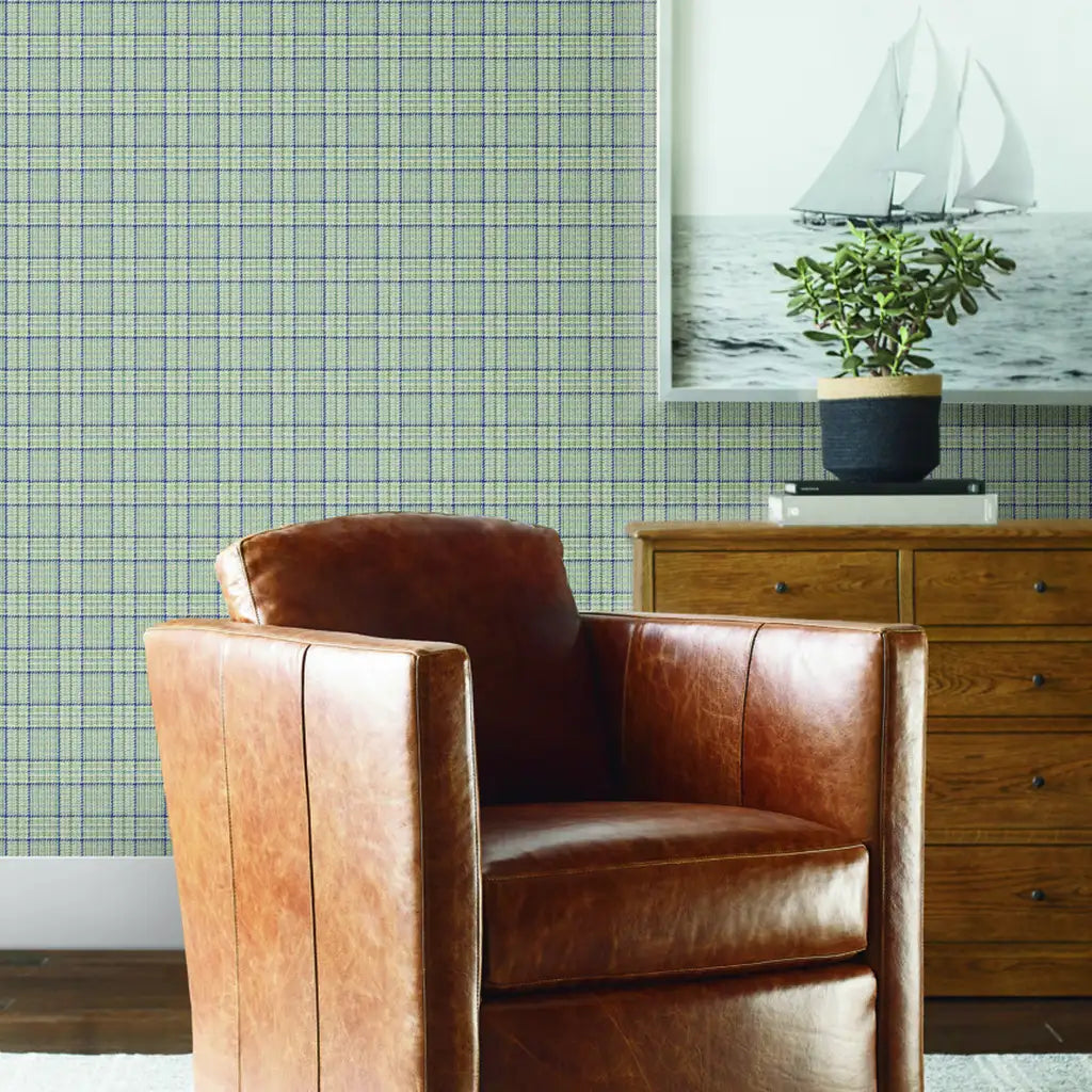 Elegant living room showcasing Harrington Plaid wallpaper in Sage Navy by York Wallcoverings, adding classic style.