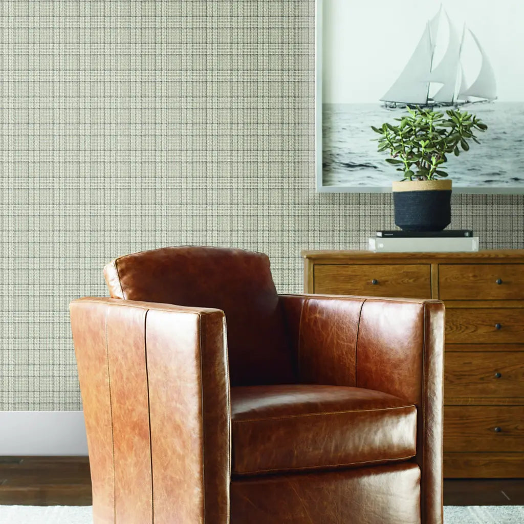 Stylish living room featuring York Wallcoverings' Harrington Plaid wallpaper in Light Beige Plaid for a timeless look.