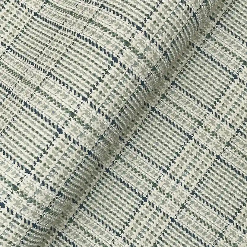 Close-up texture of Sage Navy Harrington Plaid wallpaper by York Wallcoverings, showing its intricate woven pattern.