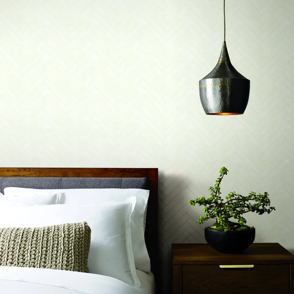 Bedroom featuring elegant Warm Ivory Herringbone Wood Veneer wallpaper by York Wallcoverings, creating a serene and stylish space.
