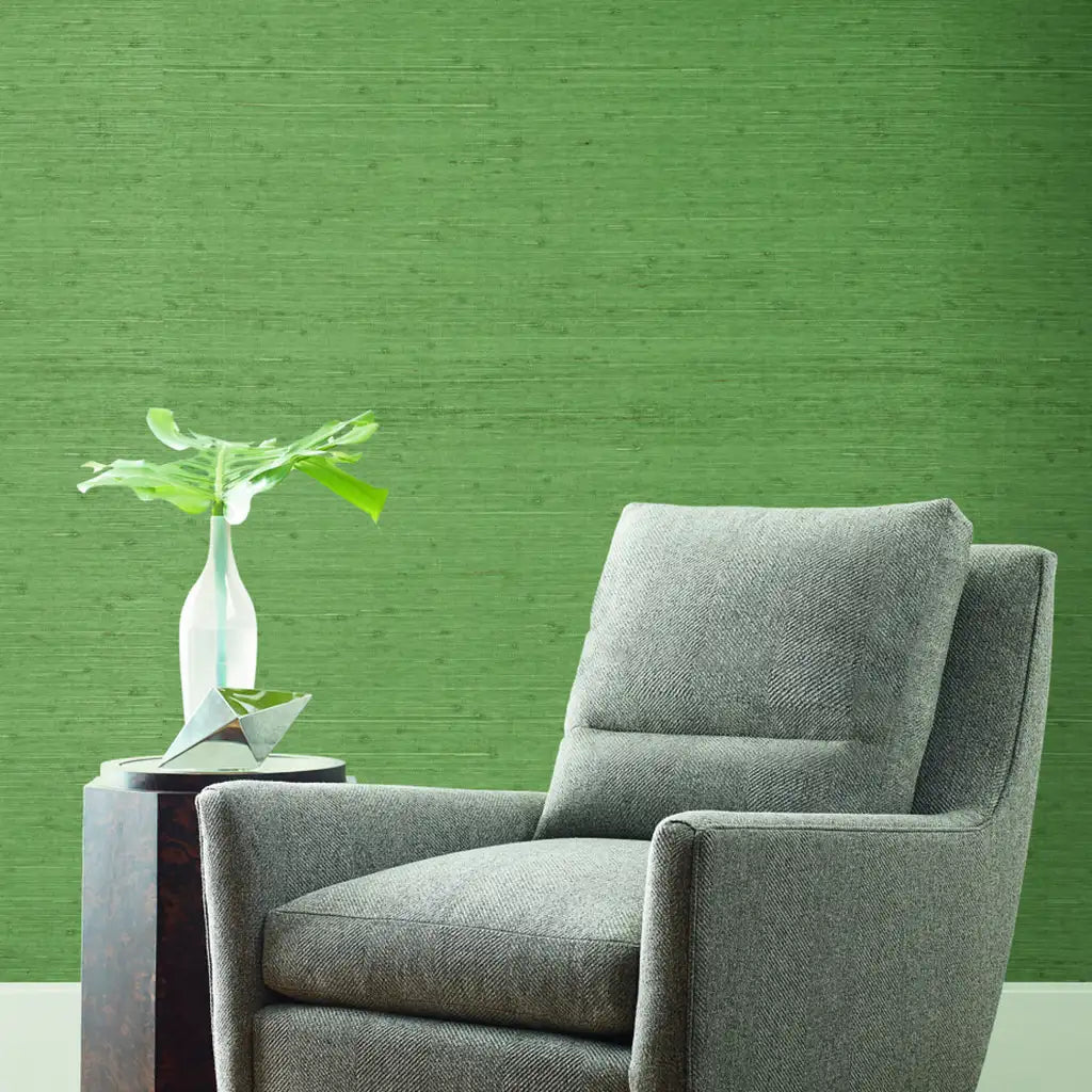 Living room featuring Sage Green 'Horizontal Jute' wallpaper by York Wallcoverings, creating a serene, textured space.