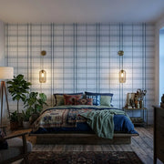 Bedroom - York Wallcoverings' Lakeside Plaid wallpaper in blue and grey creates a stylish and comfortable space.