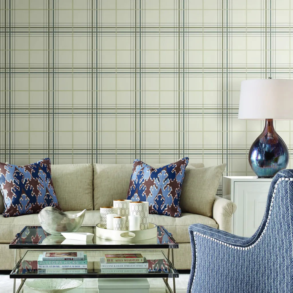 Cozy living room featuring 'Lakeside Plaid' wallpaper in Warm Ivory Neutrals by York Wallcoverings, creating a serene and inviting space.