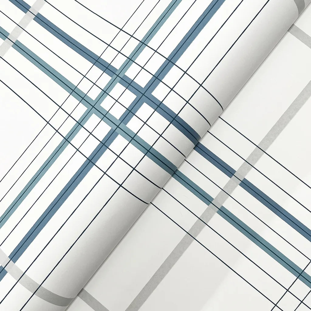 Detailed close-up of York Wallcoverings' Lakeside Plaid wallpaper, showcasing its woven blue and grey texture.