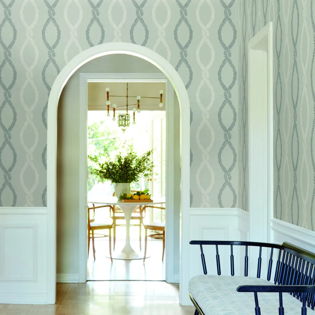 Elegant entryway featuring Laureate Grey wallpaper by York Wallcoverings, creating a sophisticated and welcoming first impression.