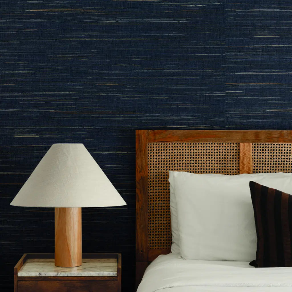 Bedroom walls adorned with textured Navy Blue and Tan Multicolored Hemp wallpaper by York Wallcoverings.