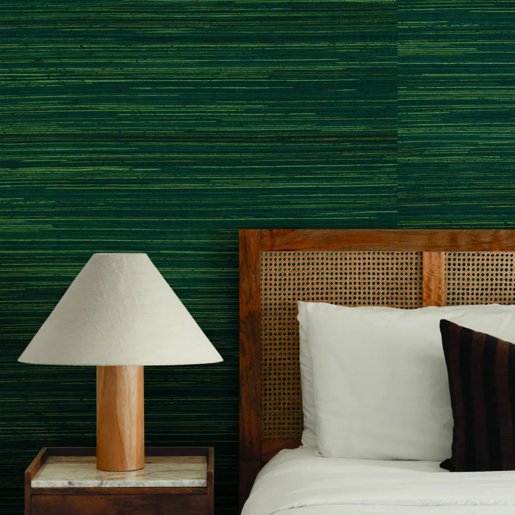 Cozy bedroom with 'Multicolored Hemp' wallpaper in Teal and Natural by York Wallcoverings, adding texture and color.