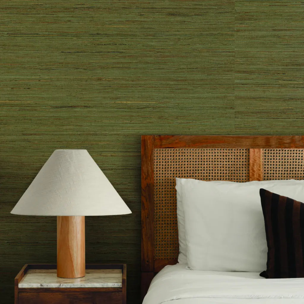 Stylish bedroom featuring York Wallcoverings' Multicolored Hemp wallpaper in Khaki Green, creating a natural, inviting space.