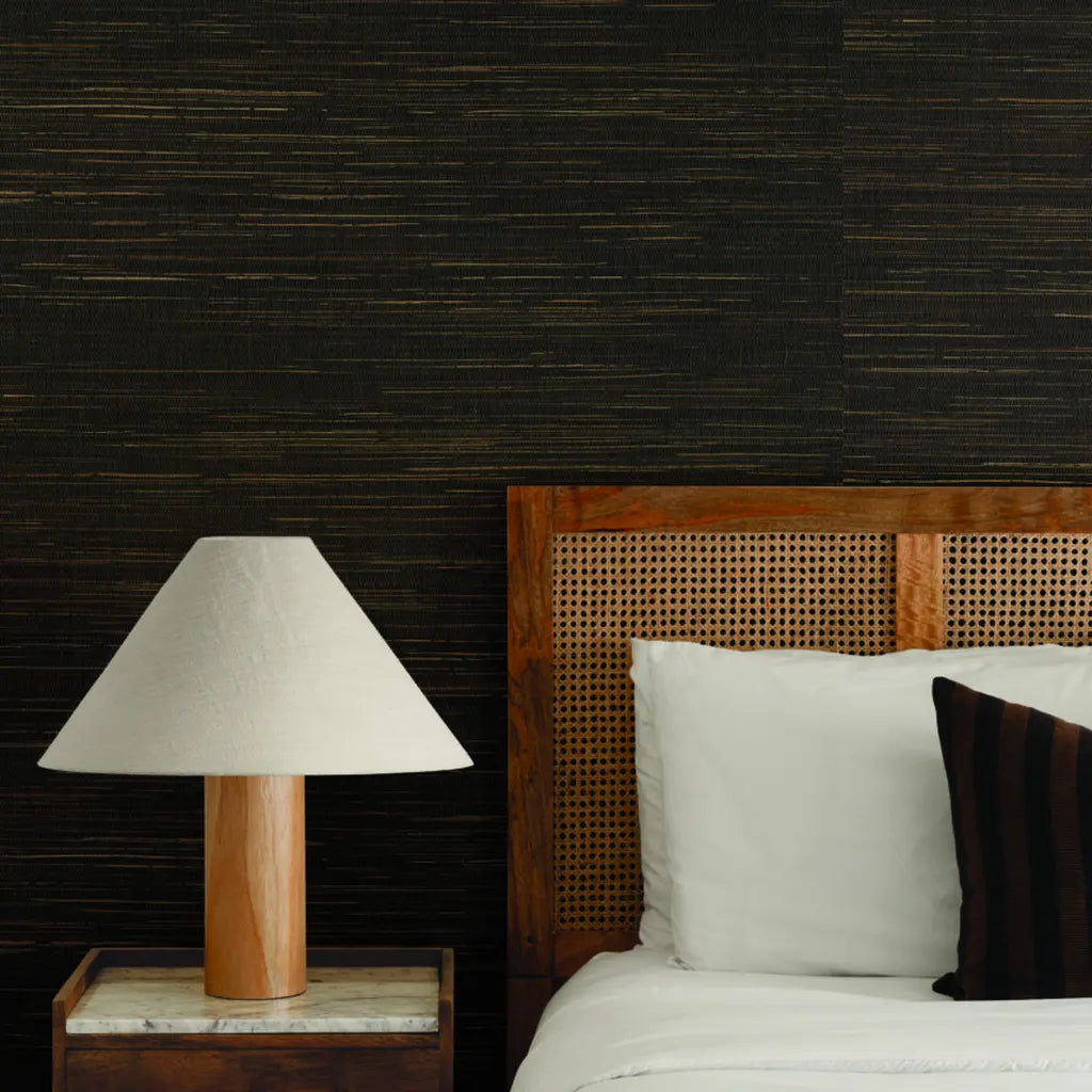 Multicolored Hemp wallpaper in Brown and Tan by York Wallcoverings adds natural texture to this cozy bedroom.