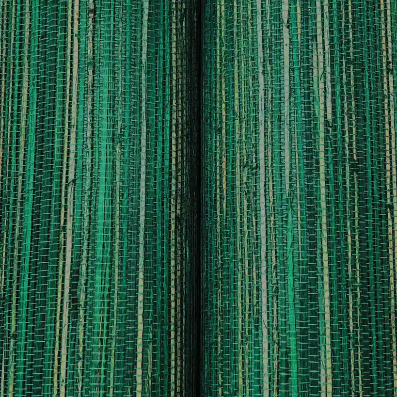 Close-up texture of York Wallcoverings' Multicolored Hemp wallpaper in Teal and Natural, highlighting intricate fibers.
